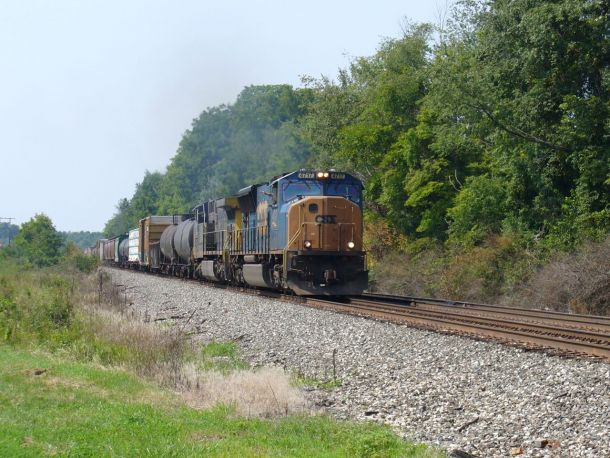 The engineer gives a wave from an eastbound near Chesterfield, August 24, 2011.